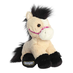 A tan Buckskin plush horse with a dark mane, hooves, and purple halter from Bridle Buddies by Breyer