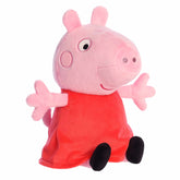 Peppa Pig plush from Aurora, featuring Peppa in a soft red dress, designed for both quality and durability