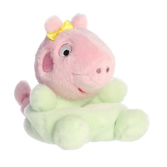 Plush toy of Baby Pig from the Peppa Pig Palm Pals collection with a yellow bow and pastel green onesie.