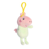 A Baby Evie clip-on plush wearing a green outfit with a yellow clip from Aurora’s Peppa Pig Collection.