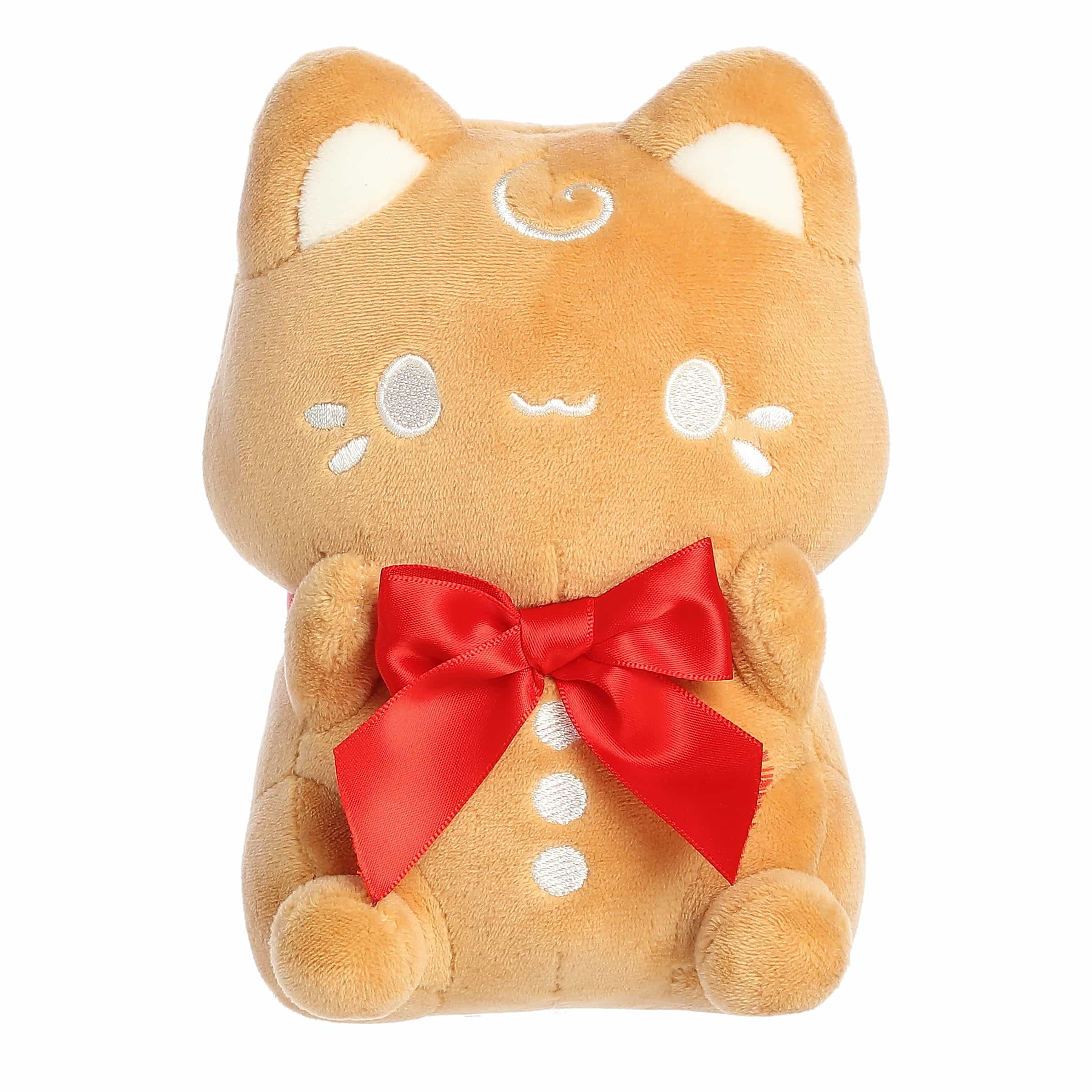 Gingerbread-colored Meowchi plush with red bow and soft texture