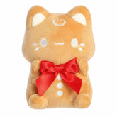 Gingerbread-colored Meowchi plush with red bow and soft texture