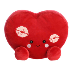 A large red heart-shaped plush with rosy cheeks and kiss marks from the Party-Sized Palm Pals Valentine's Collection
