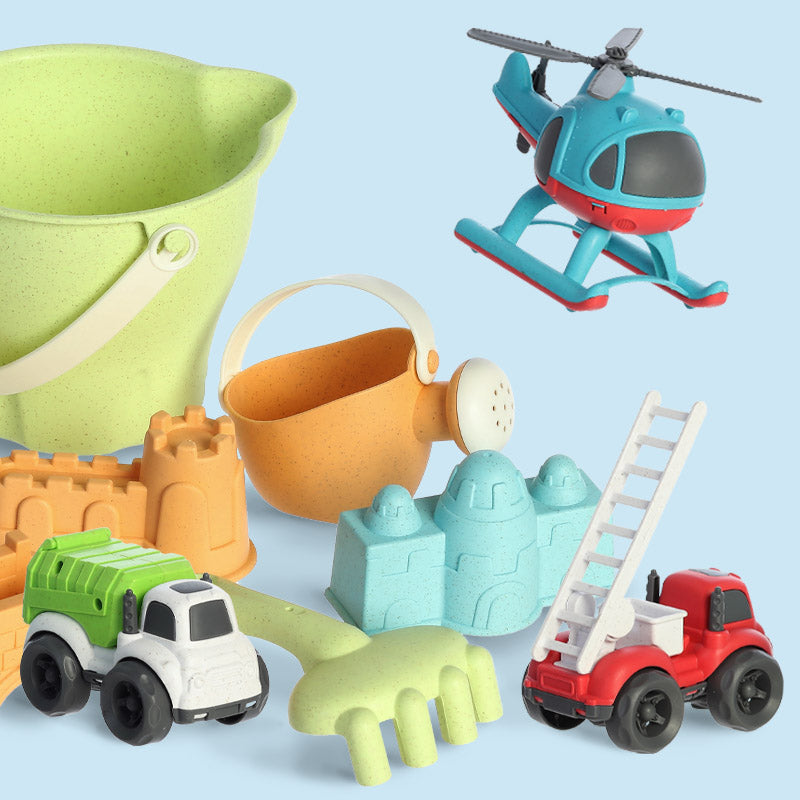 An image depicting various toys from Aurora Toys, firetruck toy, helicopter toy, garbage truck toy, and sand + beach toys