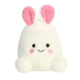 White plush bunny with pink ears and a joyful smile, shaped like an egg, fits in the palm of your hand