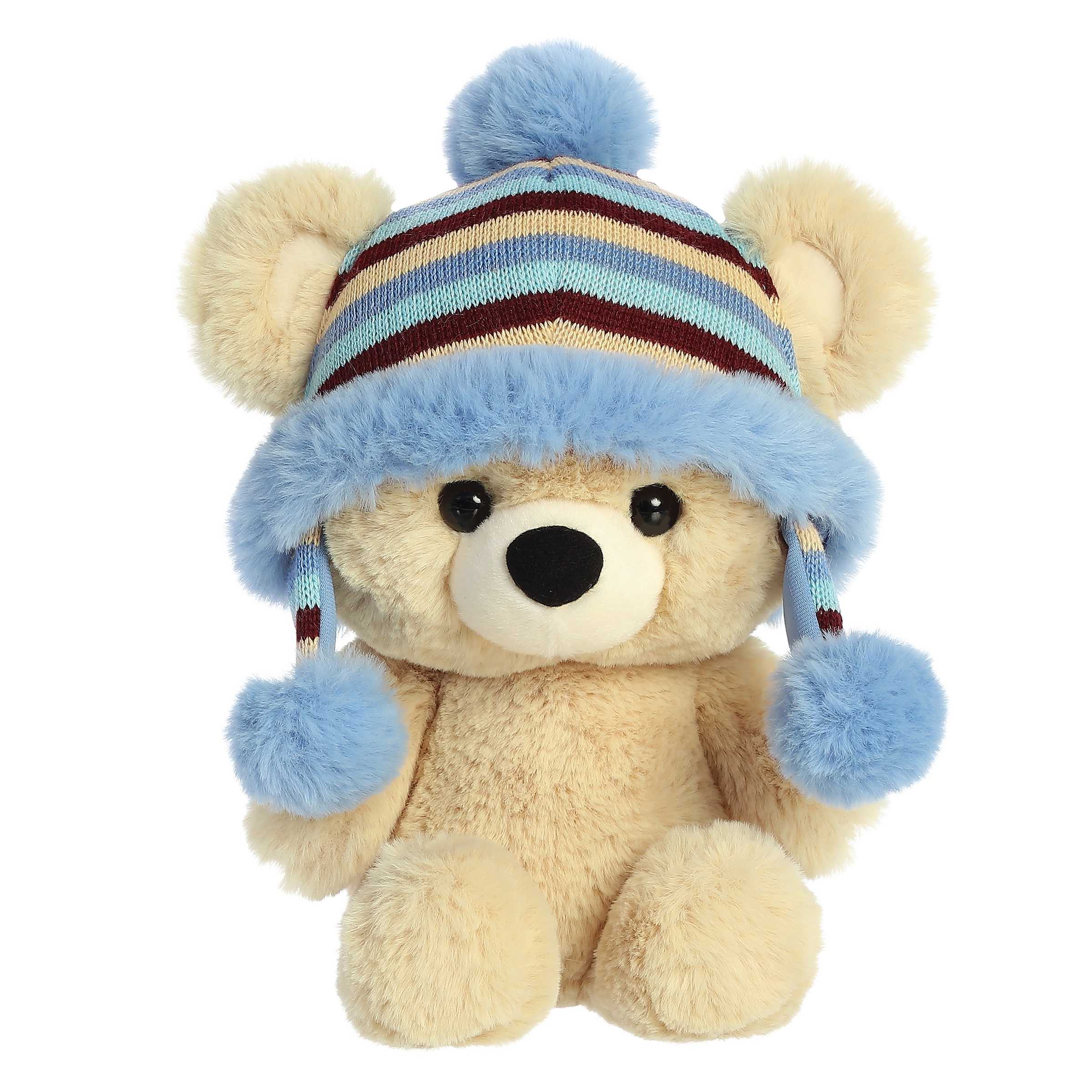 Baby Bear Bonnie from Aurora's Holiday Collection, with a festive striped hat, perfect for Christmas cuddles and joy.