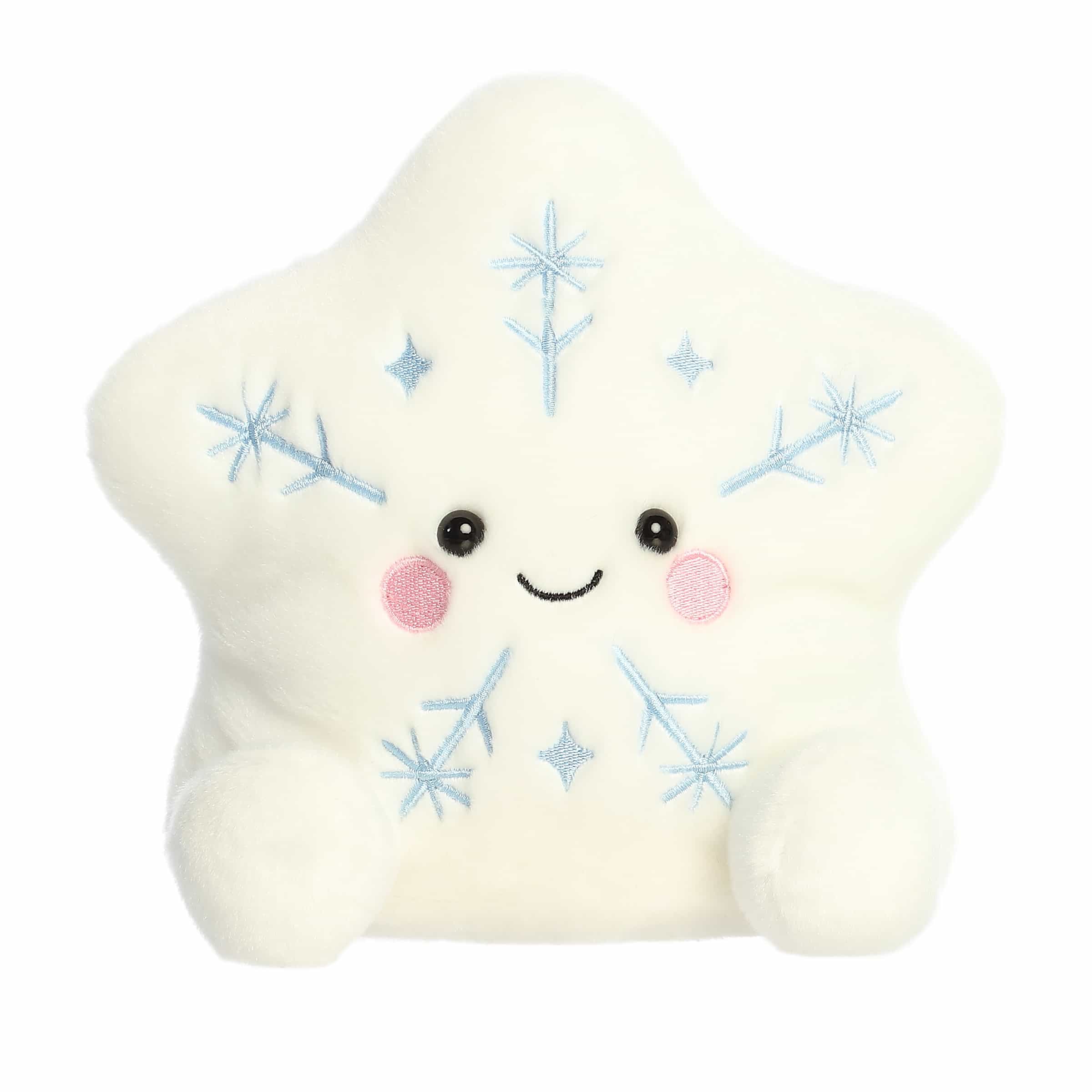 Oversized snowflake plush with soft white body, blue embroidery, blushing cheeks, and bright smile