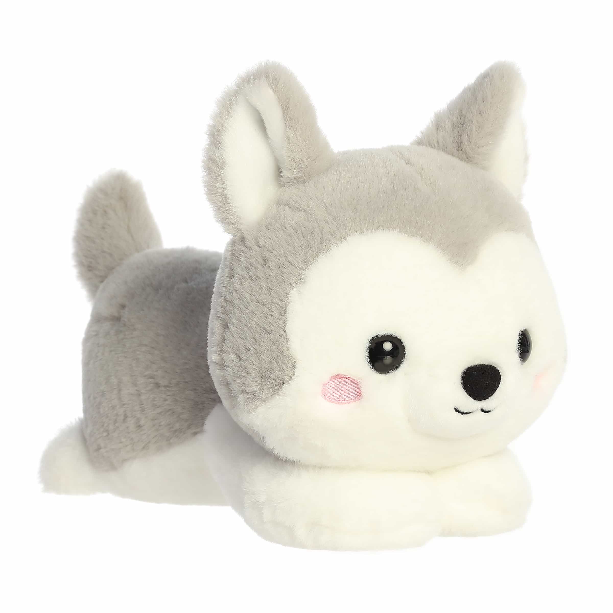 Belly-down husky plush with soft gray and white fur, floppy limbs, and a sweet face