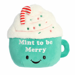 Plush mint-colored holiday mug with festive details and punny phrase—ideal for gifting, décor, and spreading seasonal cheer.