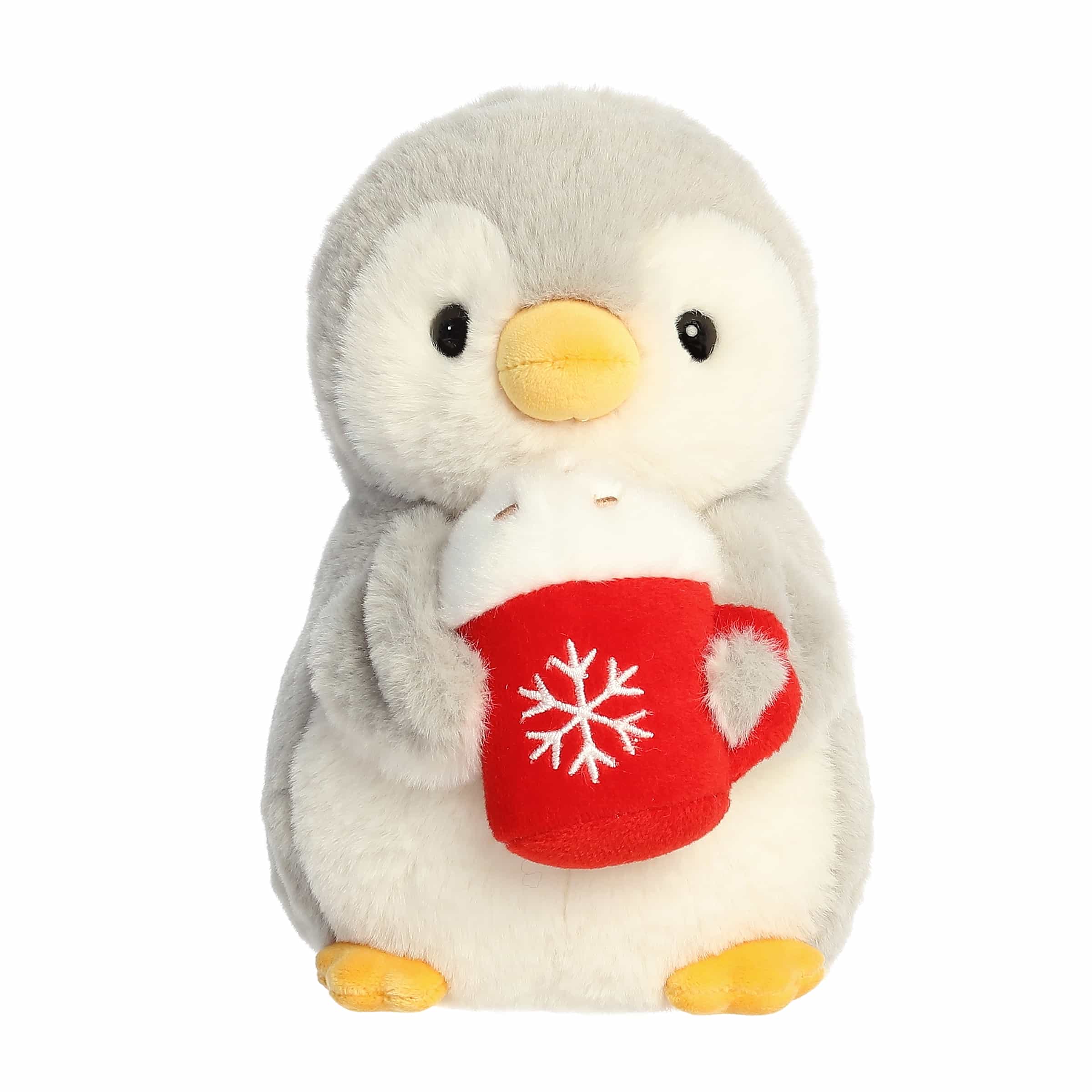 Penguin plush holding a red latte mug, featuring soft fabric and cute details