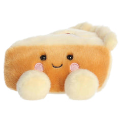Golden apple pie plush with a smiling face and fits in the palm of your hand.