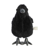 Wind Up Raven Halloween toy with black raven body, orange beak, and wind-up feet