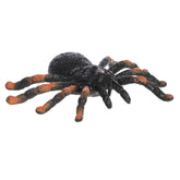 Spider Squish Animal toy with black spider body, long legs, and squishy bean-filled design