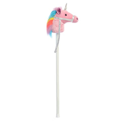 A pink unicorn hobby horse toy from Giddy-Up Friends with a unicorn plush head, silver horn, and rainbow mane.