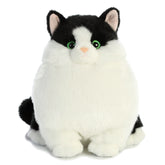 Plush toy of a black and white tuxedo cat with green eyes and extra-fluffy plush body.