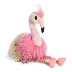 A luxurious, long-haired rainbow flamingo stuffed animal that has a body resembling the real-life counterpart.