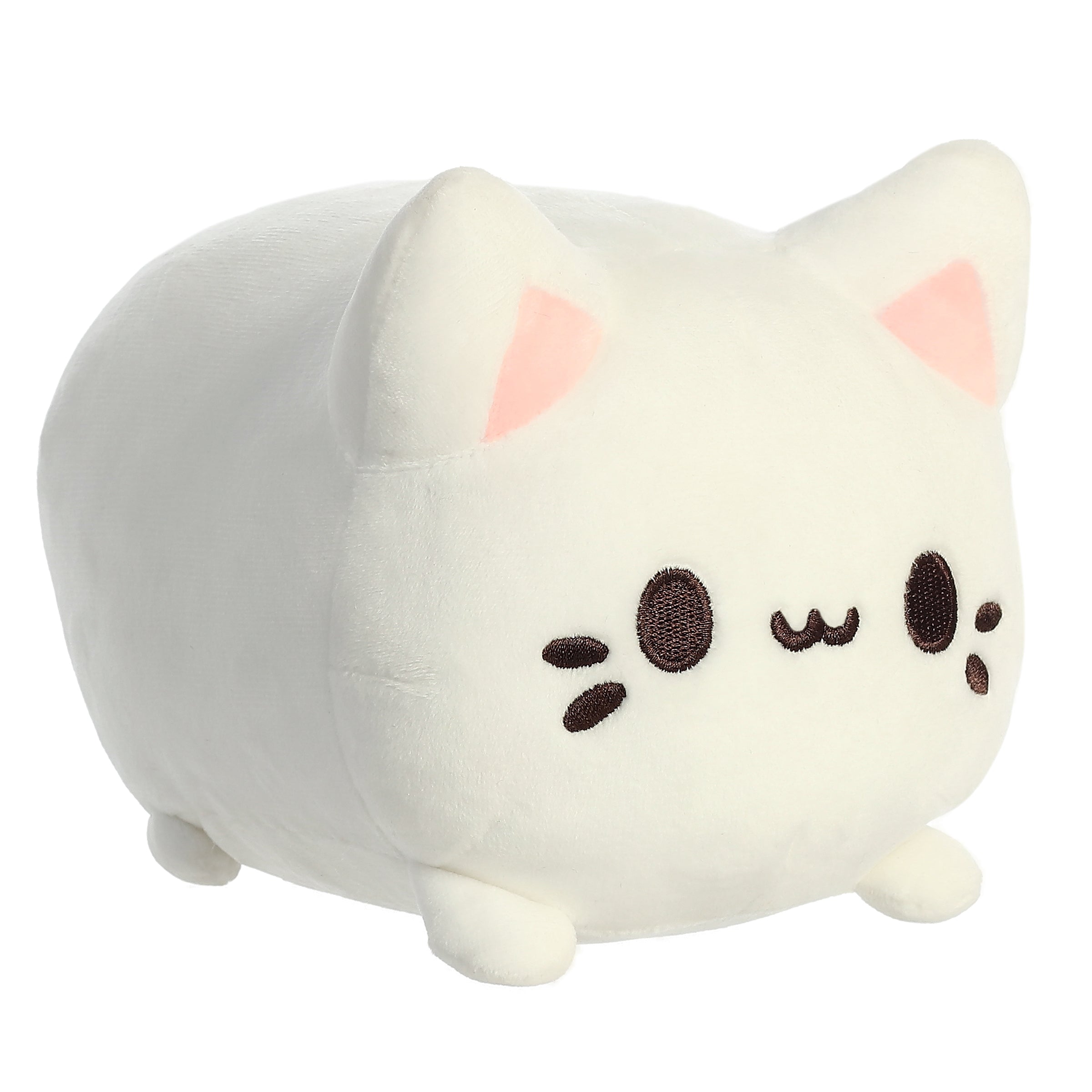A yellow plush Meowchi toy from Tasty Peach with round features and soft fabric, resembling a custard dessert