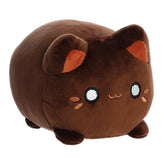 A dark brown Tasty Peach Meowchi plush that is a round cylinder shape with the resemblance of an animated happy cat.