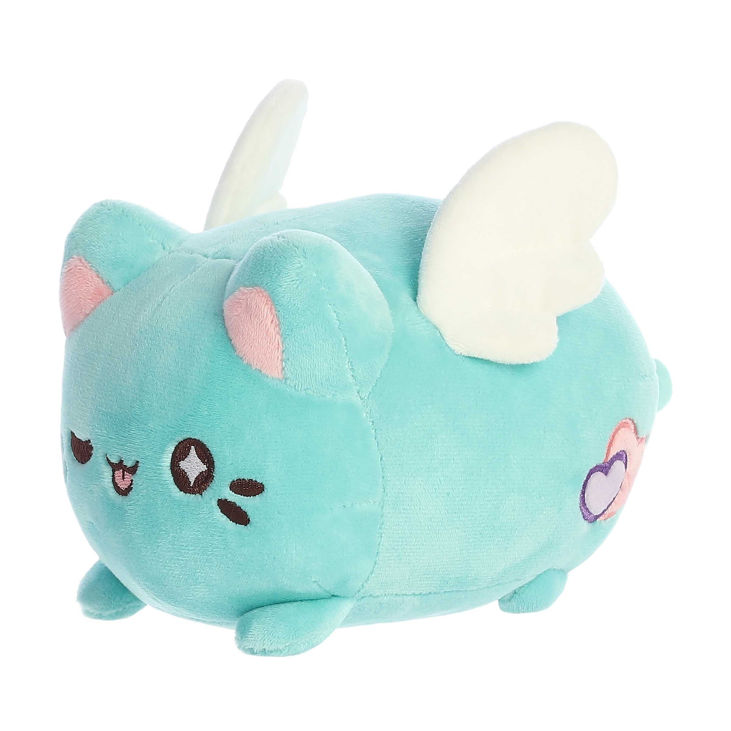 Mint Candy Heart Meowchi with white wings and pink ear accents. Soft mint-colored plush from Tasty Peach line by Aurora.