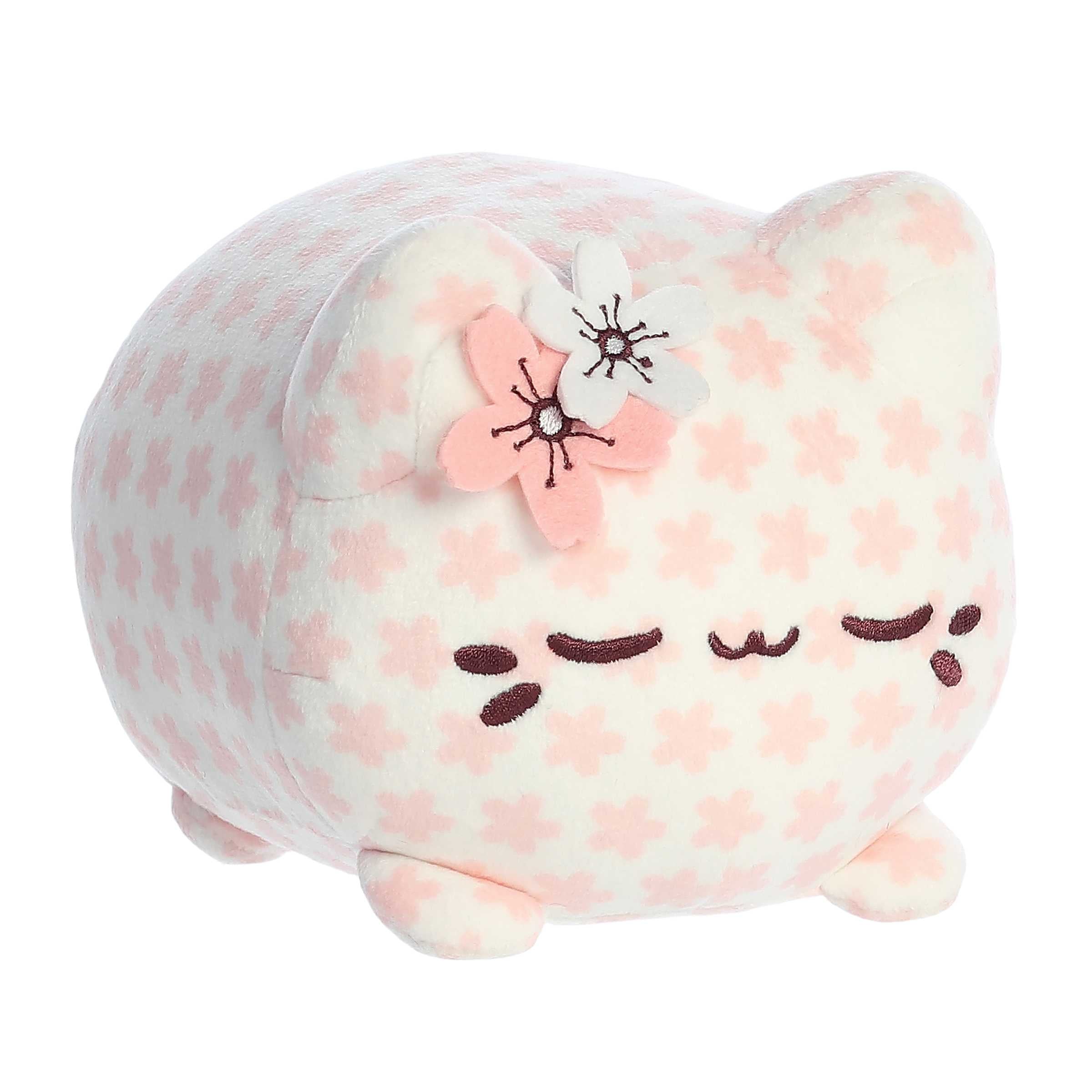 Adorable Sakura Meowchi plush in soft pink, with a sleepy-eyed charm, perfect for collectors and plush lovers.