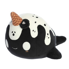 Adorable Narwhal plush with cookies and cream design and a playful ice cream cone horn, ready for sweet Tasty Peach snuggles.
