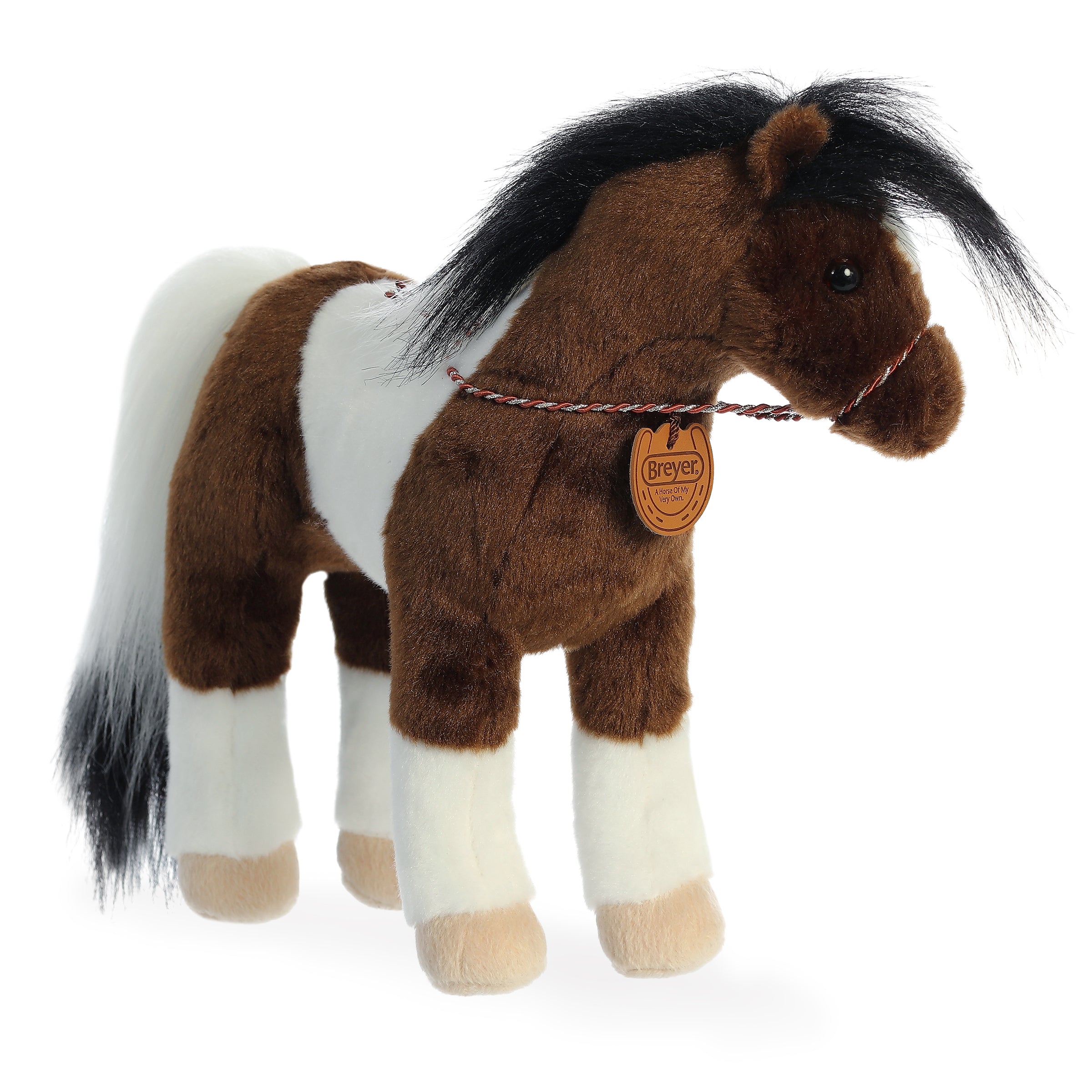 Paint Horse plush from Breyer - Showstoppers by Aurora, featuring distinct patches and a flowing black mane.