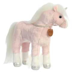 Aurora unicorn plush from Breyer - Showstoppers by Aurora, with pink coat, silver hooves, and a white flowing mane.