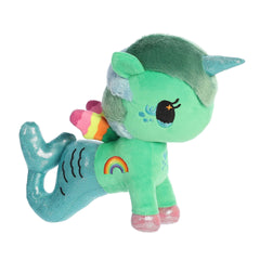 Colorful tokidoki Isla Mermicorno plush with blue tailfin, green body, blue horn, and rainbow wings for whimsical adventures.