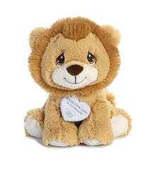 A lion plush toy from Precious Moments by Aurora with golden fur and a fluffy mane.