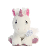 A white unicorn plush toy with a pink horn, ears, hooves, and a sweet embroidered face by Aurora stuffed animals.