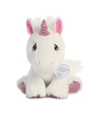 A white unicorn plush toy with a pink horn, ears, hooves, and a sweet embroidered face by Aurora stuffed animals.