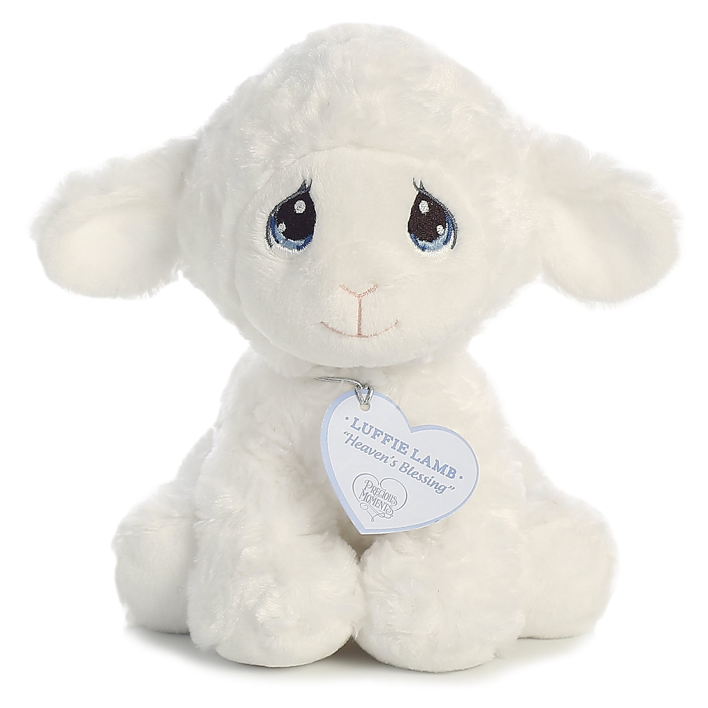 A lamb plush with tear-drop eyes, cloud-like white fur, and a precious moments inspirational tag on its neck.