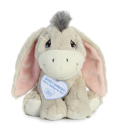 A grey donkey plush toy from Precious Moments with pink-lined floppy ears and a tuft of hair on its head.