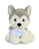A grey and white wolf plush toy from Precious Moments with perky ears and a friendly expression.