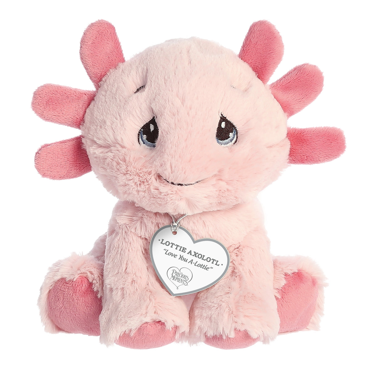 A sitting-down pink axolotl plush with tear-drop eyes and a precious moments inspirational tag around its neck.