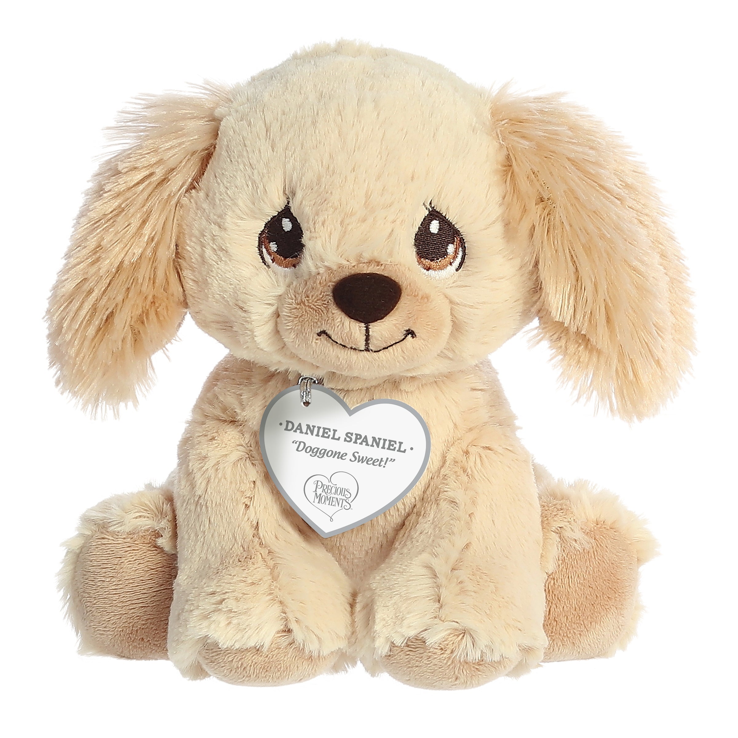 A sitting-down golden terrier dog plush with tear-drop eyes and a precious moments inspirational tag around its neck.