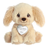 A sitting-down golden terrier dog plush with tear-drop eyes and a precious moments inspirational tag around its neck.