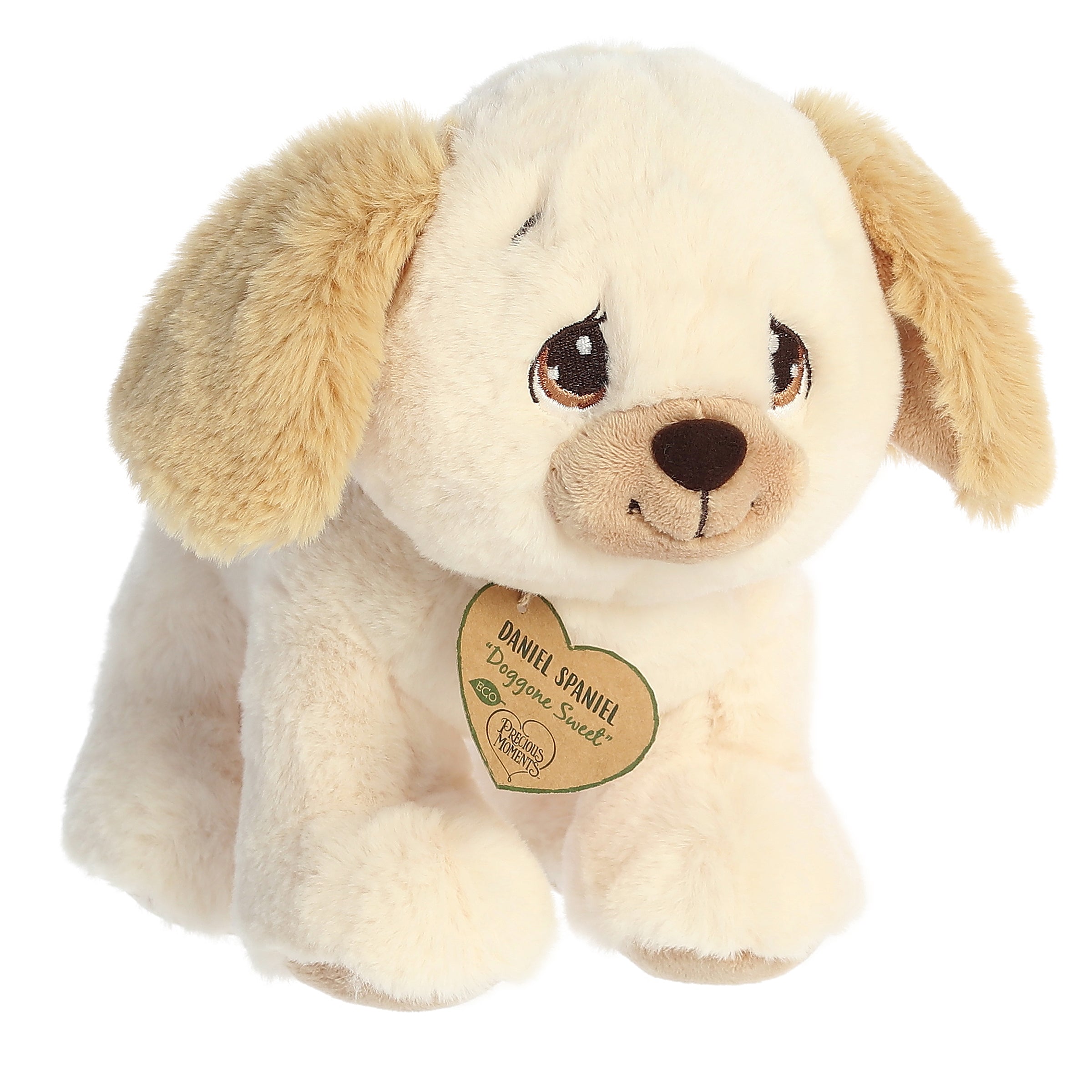 A sitting-down golden terrier dog plush with tear-drop eyes and a precious moments inspirational tag around its neck.