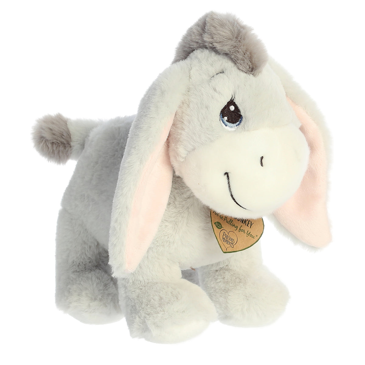 An eco-friendly donkey plush with tear-drop eyes, long floppy ears, and a precious moments inspirational tag around its neck.