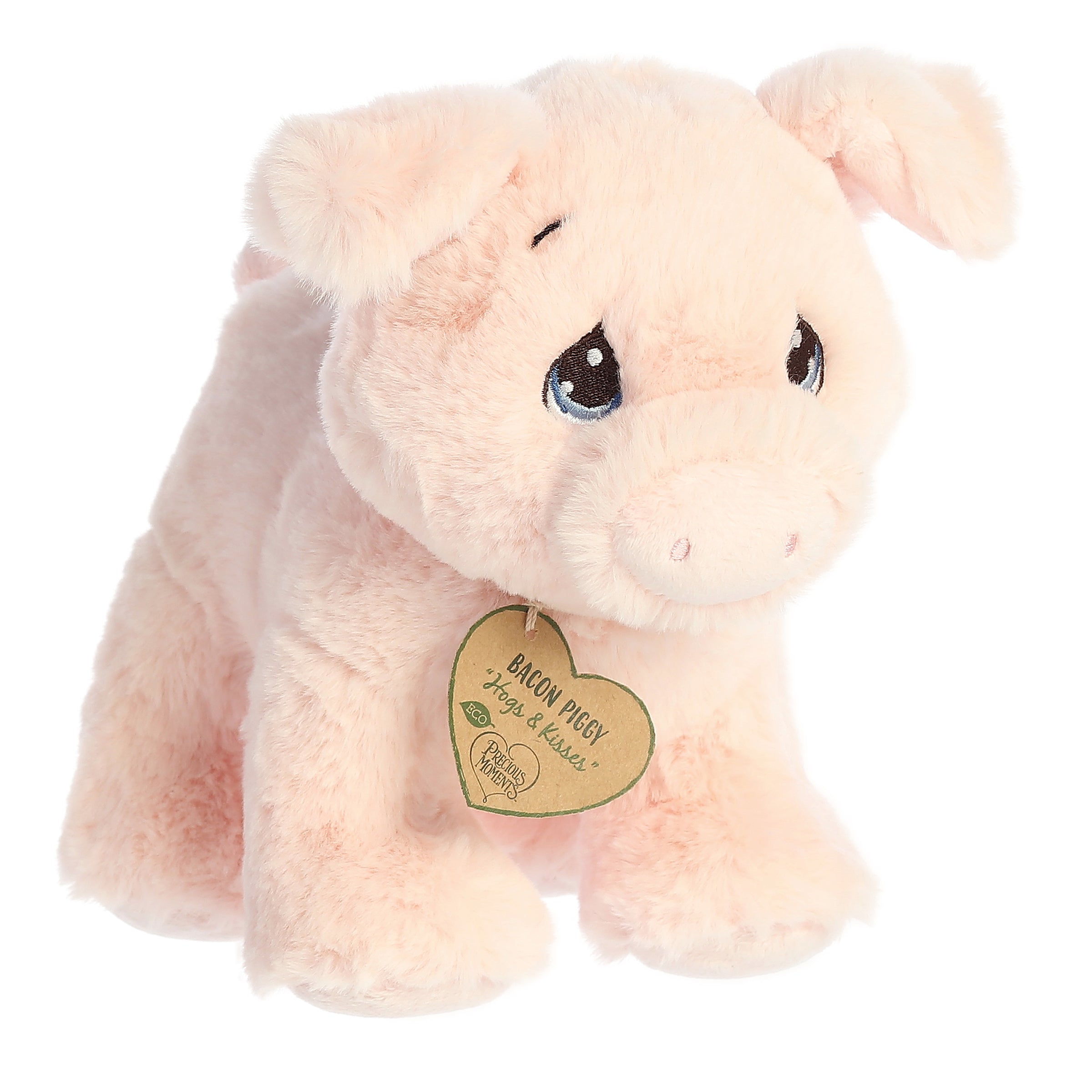 An eco-friendly piggy plush with tear-drop eyes, soft pink fur, and a precious moments inspirational tag on its neck.