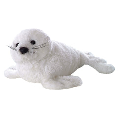 A white harp seal plush toy from Aurora’s Mini Flopsie collection with soft fur, whiskers, and expressive eyes.