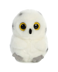 A white owl plush toy from the Rolly Pet collection by Aurora with yellow eyes and soft wings.