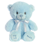 A blue teddy bear plush toy from ebba with embroidered eyes and a matching satin bow.