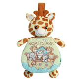 A giraffe plush toy from ebba with soft yellow fur, brown spots, and an attached Noah’s Ark crinkle book.