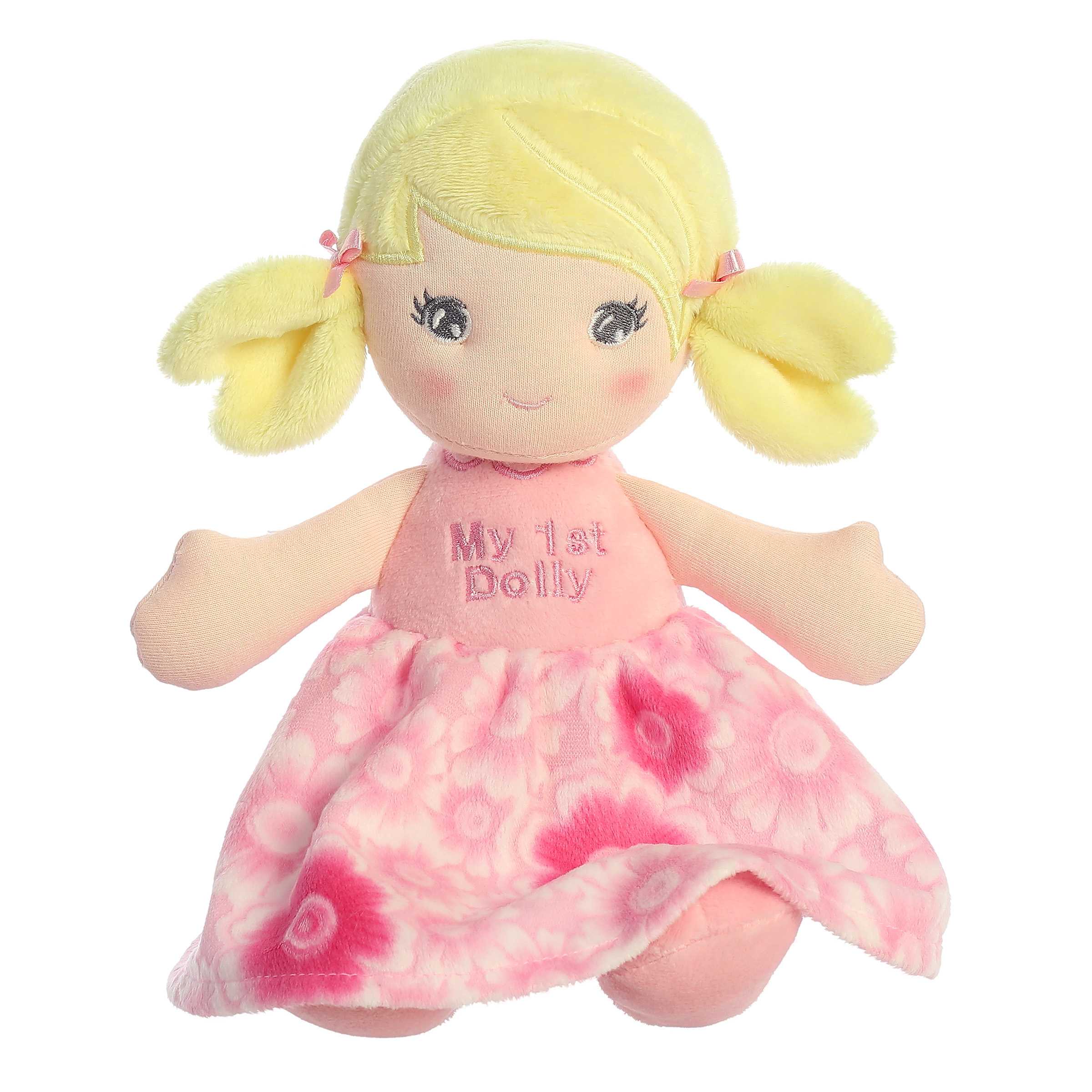 Blonde First Doll from ebba, featuring a soft body and flower dress, ideal for comforting snuggles and playful moments.