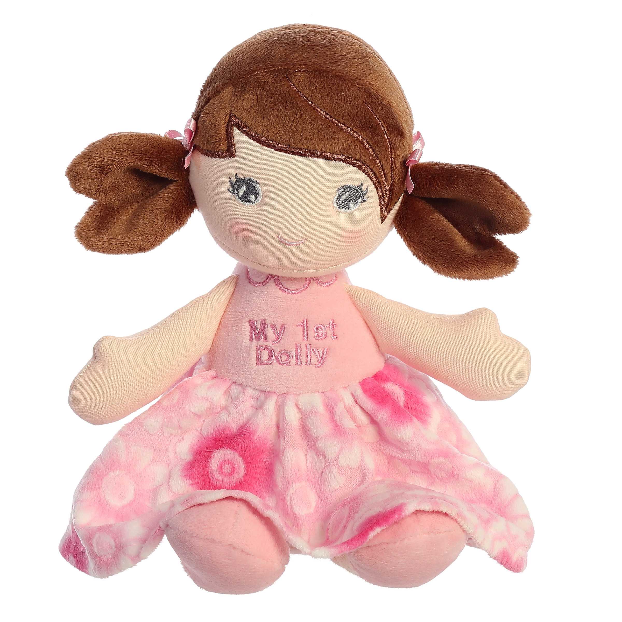 Brunette First Doll from ebba, soft and cuddly with a flower dress, perfect for providing comfort and creating memories.