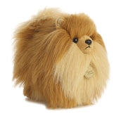 A golden Pomeranian dog plush toy from Miyoni by Aurora with fluffy fur and a cheerful expression.