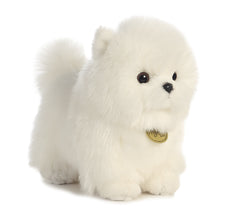 A white Pomeranian stuffed animal from Miyoni Tots by Aurora with fluffy fur and a round face.