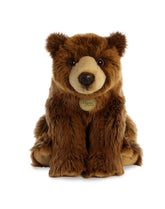 A brown bear plush toy from Miyoni by Aurora with soulful eyes and a soft, huggable body.