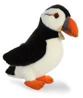 A puffin plush toy from Miyoni by Aurora with black and white feathers and a bright orange beak.